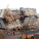 Illustration for article titled The Joy Of Watching Huge Buildings Implode